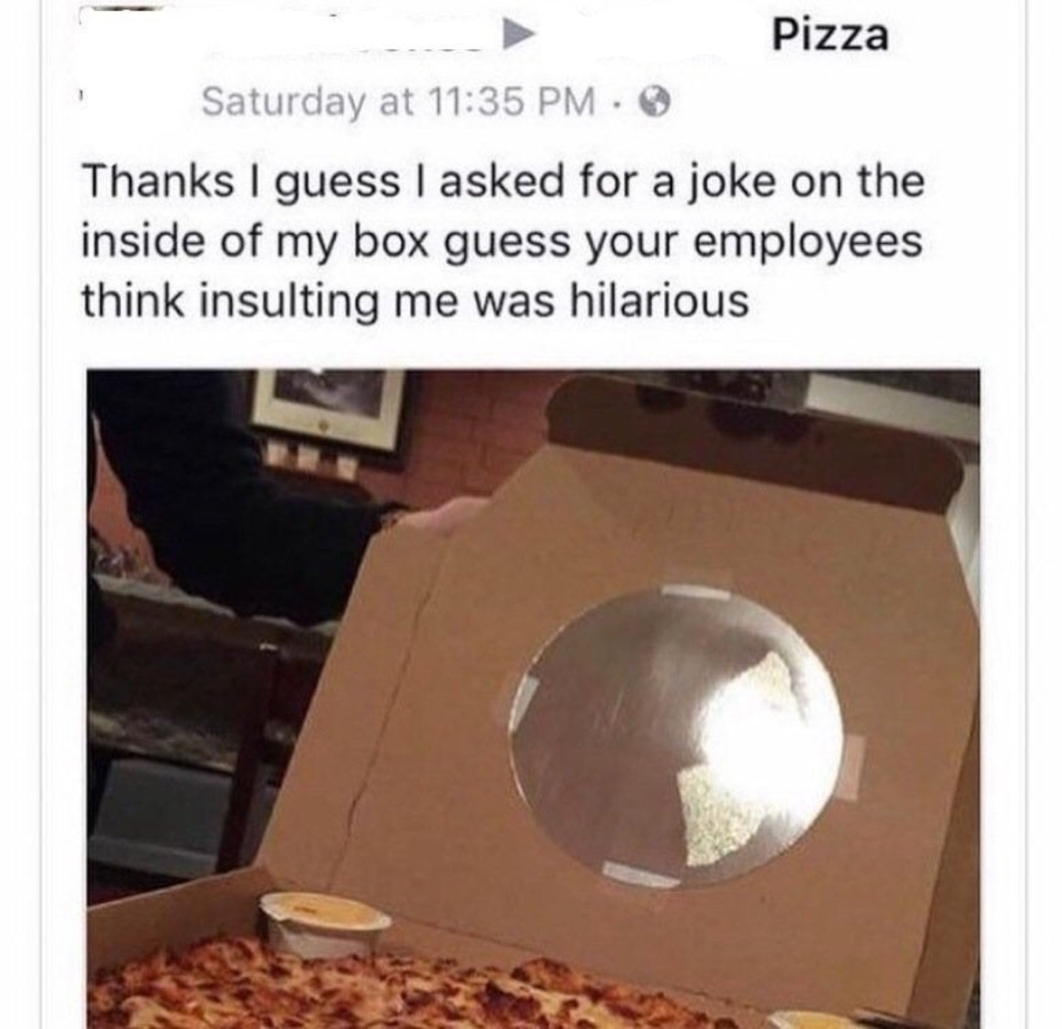 A person asks a pizza place to insult them and they send a mirror on a pizza box
