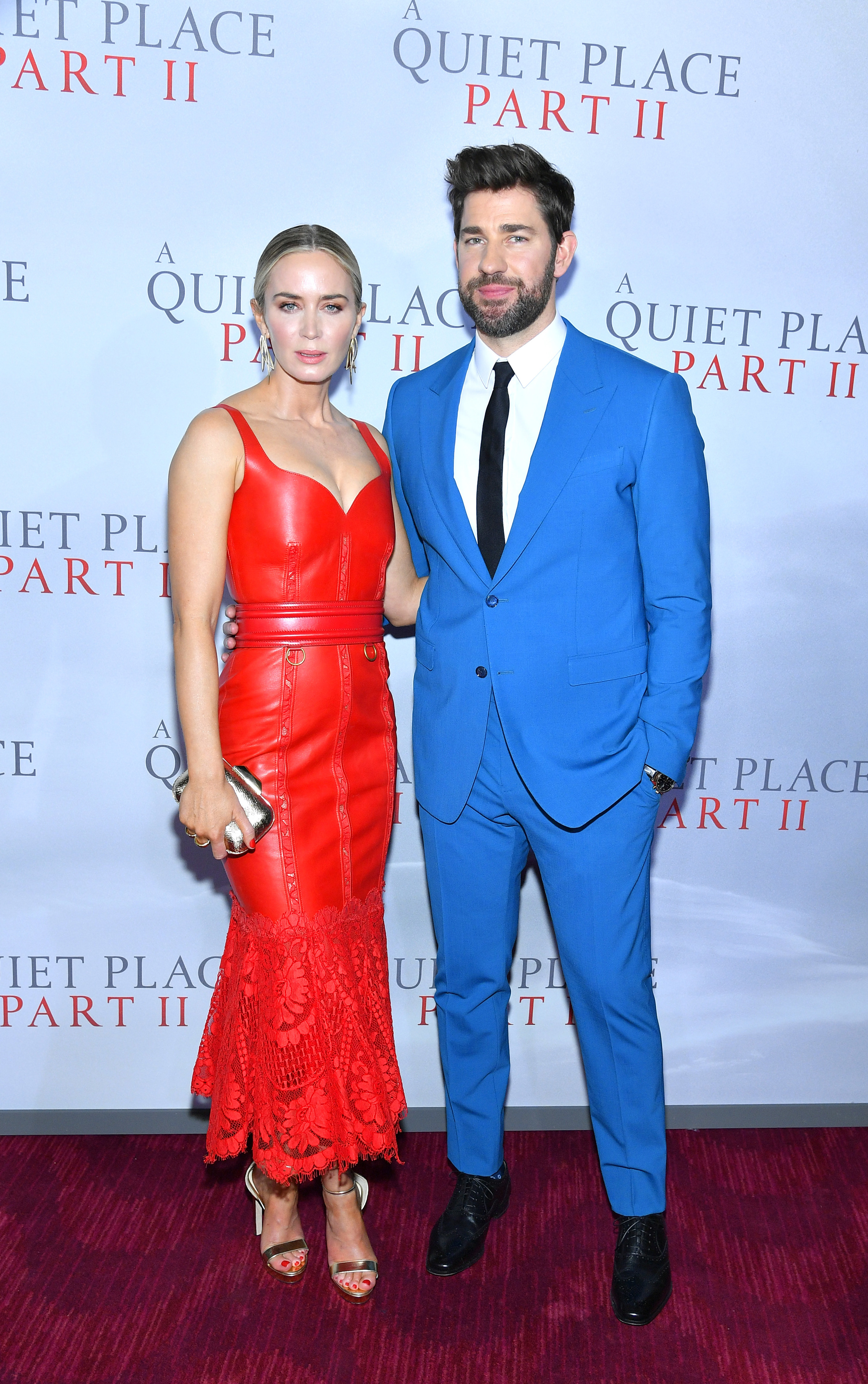 in red and blue on a red carpet