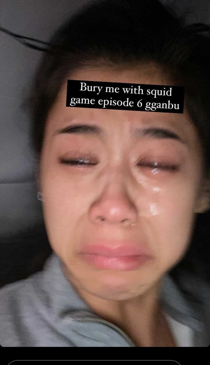 Screenshot from Leah&#x27;s IG story showing her crying with the caption &quot;Bury me with squid game episode 6 gganbu&quot;