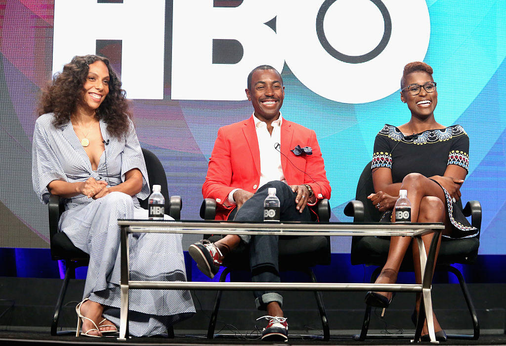 Prentice and Issa smiling at an HBO panel