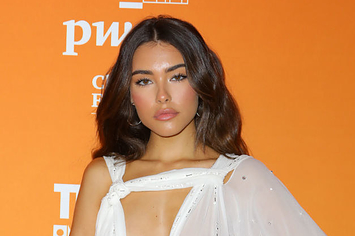 Madison Beer posing at a press event
