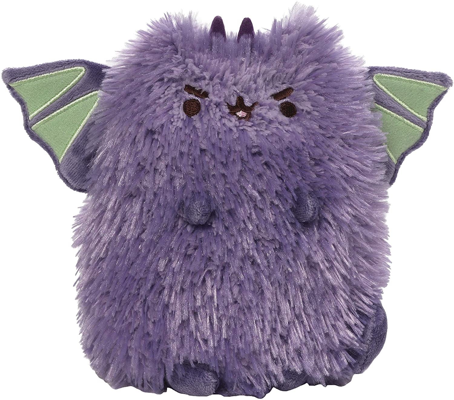 the purple and green plush of a kitten dressed like a dragon