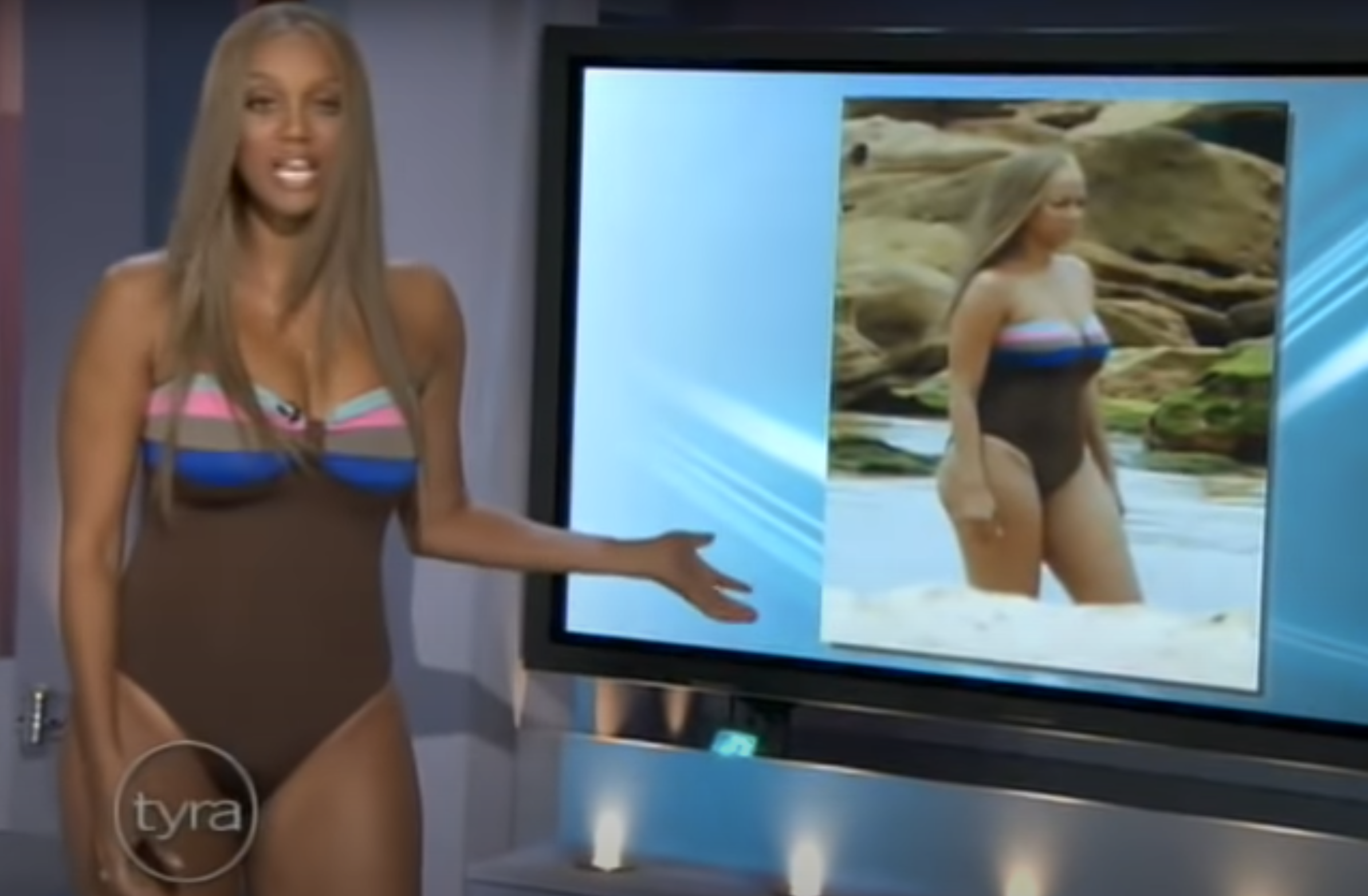 Tyra on her show and pointing to the photo that was shared in the tabloids