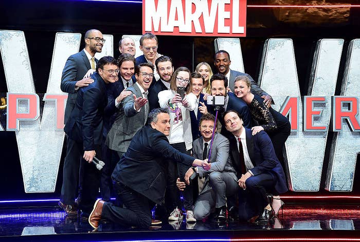 Cast members pose with competition winner Lottie French (C) for a selfie during the European Premiere of &quot;Captain America: Civil War&quot;