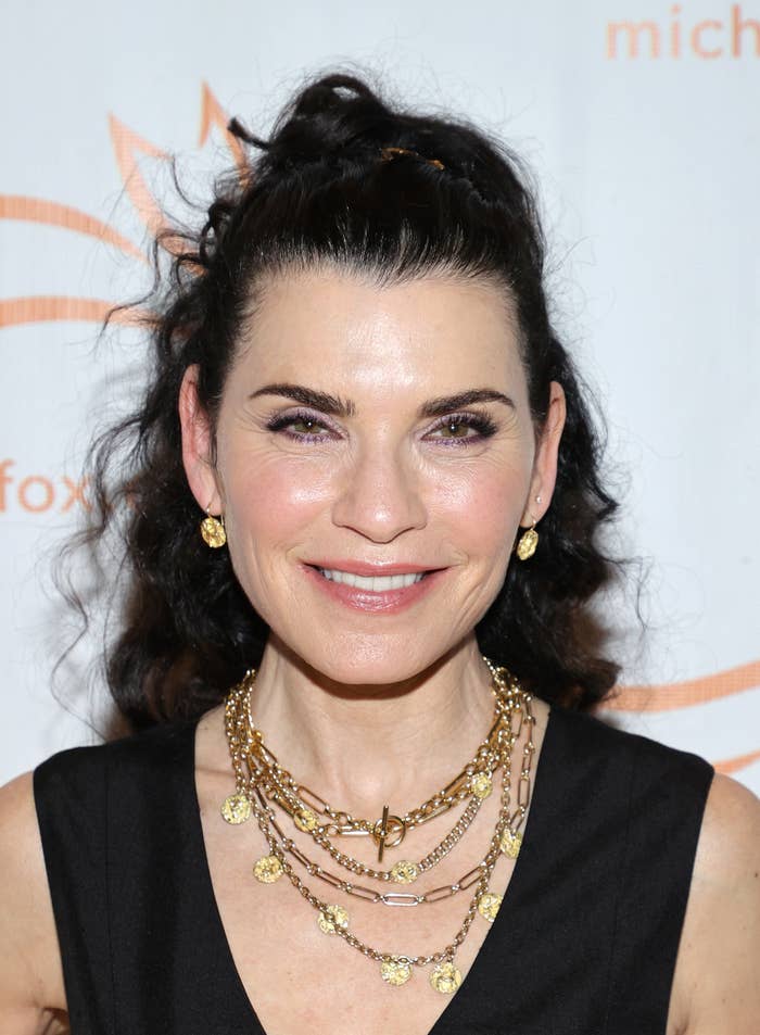 Julianna Margulies smiles for a photo at an event
