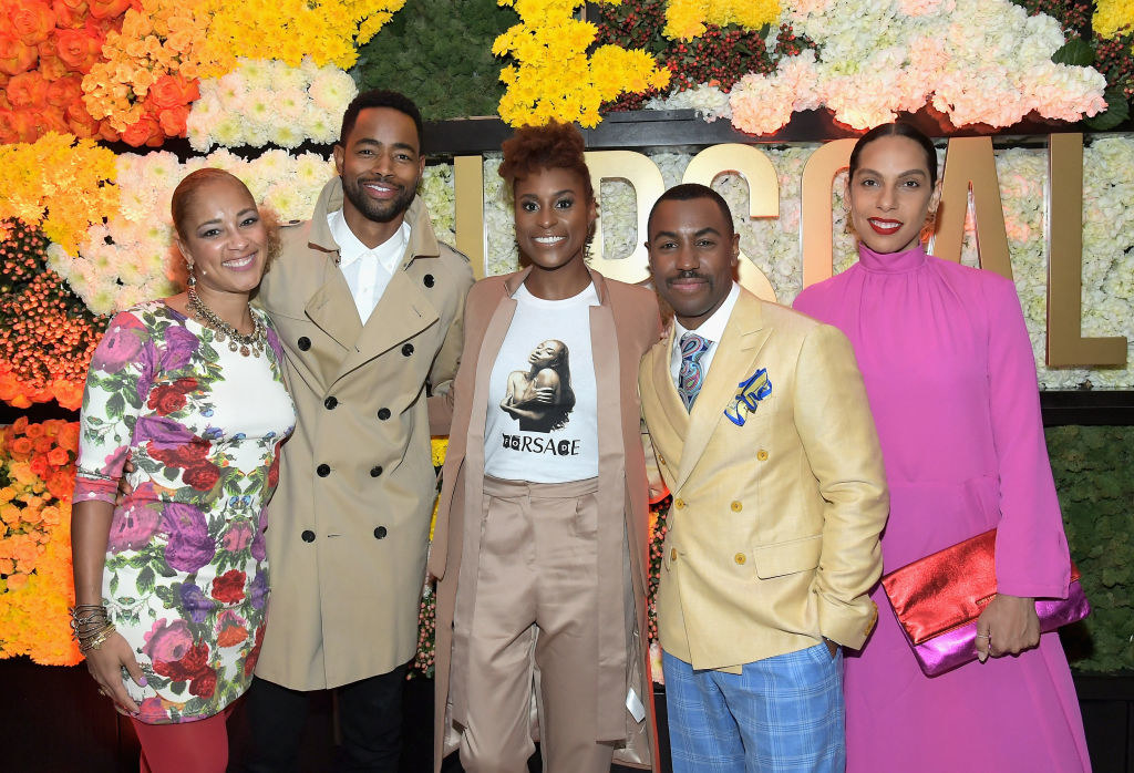 From left to right, Amanda Seales, Jay Ellis, Issa, Prentice, and Melinda Matsoukas pose for the camera