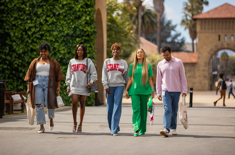 Still of &quot;Insecure&quot; Season 5, Episode 1, from left to right stand Natasha Rothwell, Yvonne, Issa, Amanda, and Wade Allain-Marcus, who are walking around Stanford