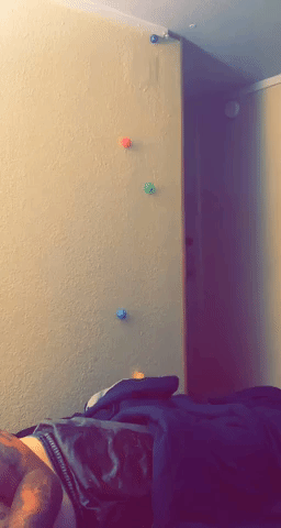 Reviewer's video showing the sticky balls sliding down the wall
