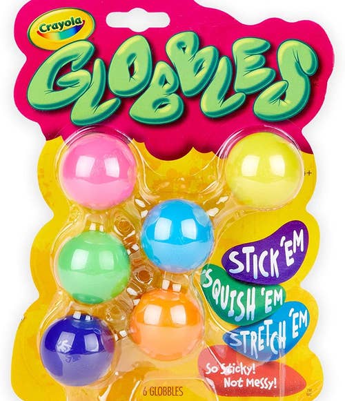 Six colored balls in yellow packaging