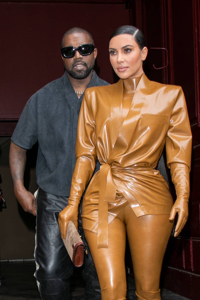 Kim Kardashian shows off fit figure in SKIMS outfit as star is 'conflicted'  about divorce from cheating Kanye West