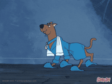 Scooby Do walking around in a robe and slippers