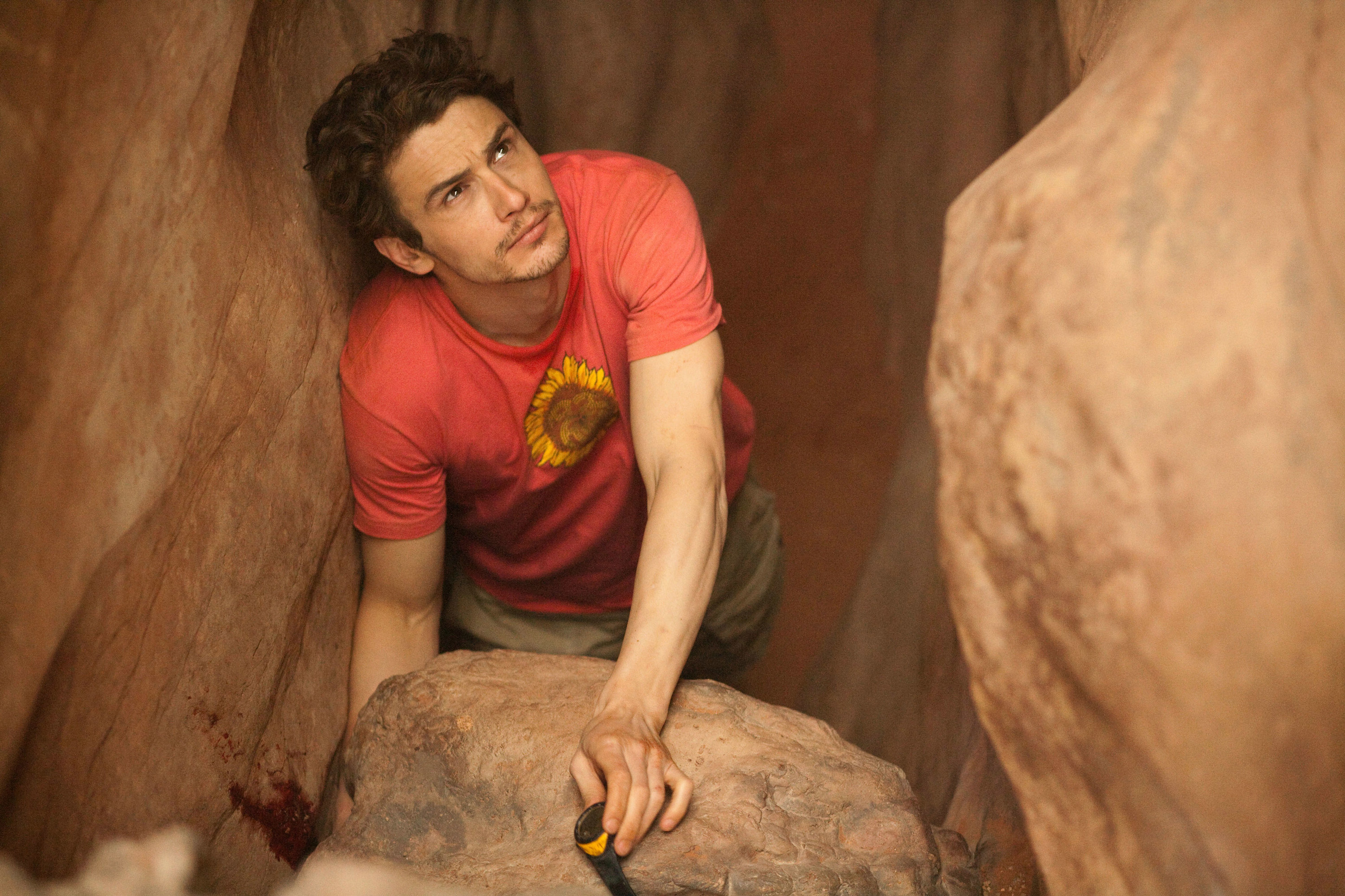Franco as Ralston trapped in the rock
