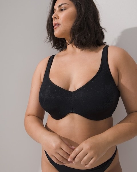 Model wearing black bra