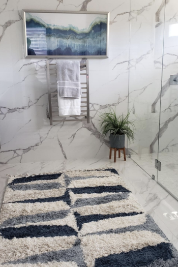 reviewer's bathroom with the towel rack on the far wall