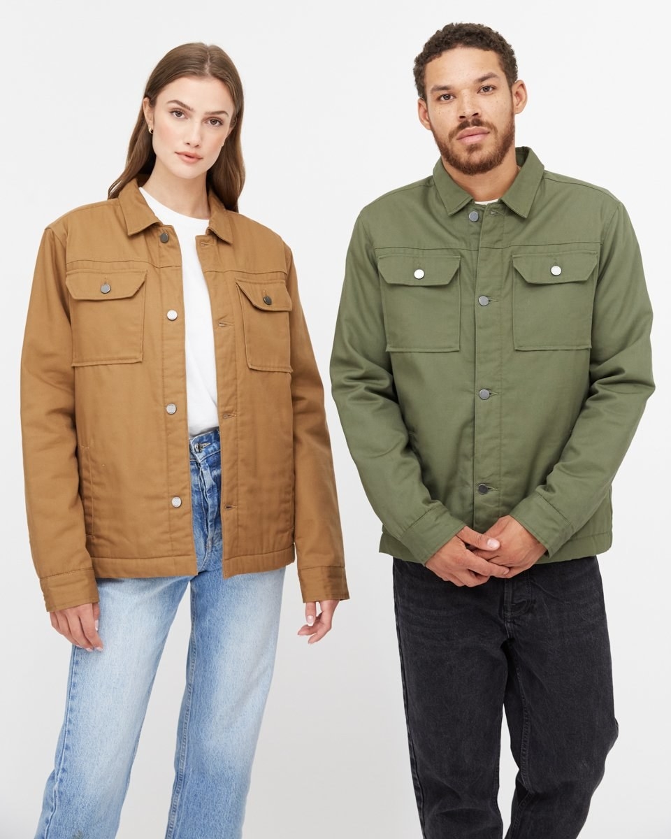 Two people wearing the jacket with casual outfits