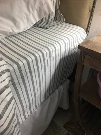 after image of the fitted sheet secured using Bed Band