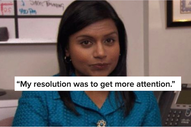 A close up of Kelly Kapoor as she wears a brightly colored suit