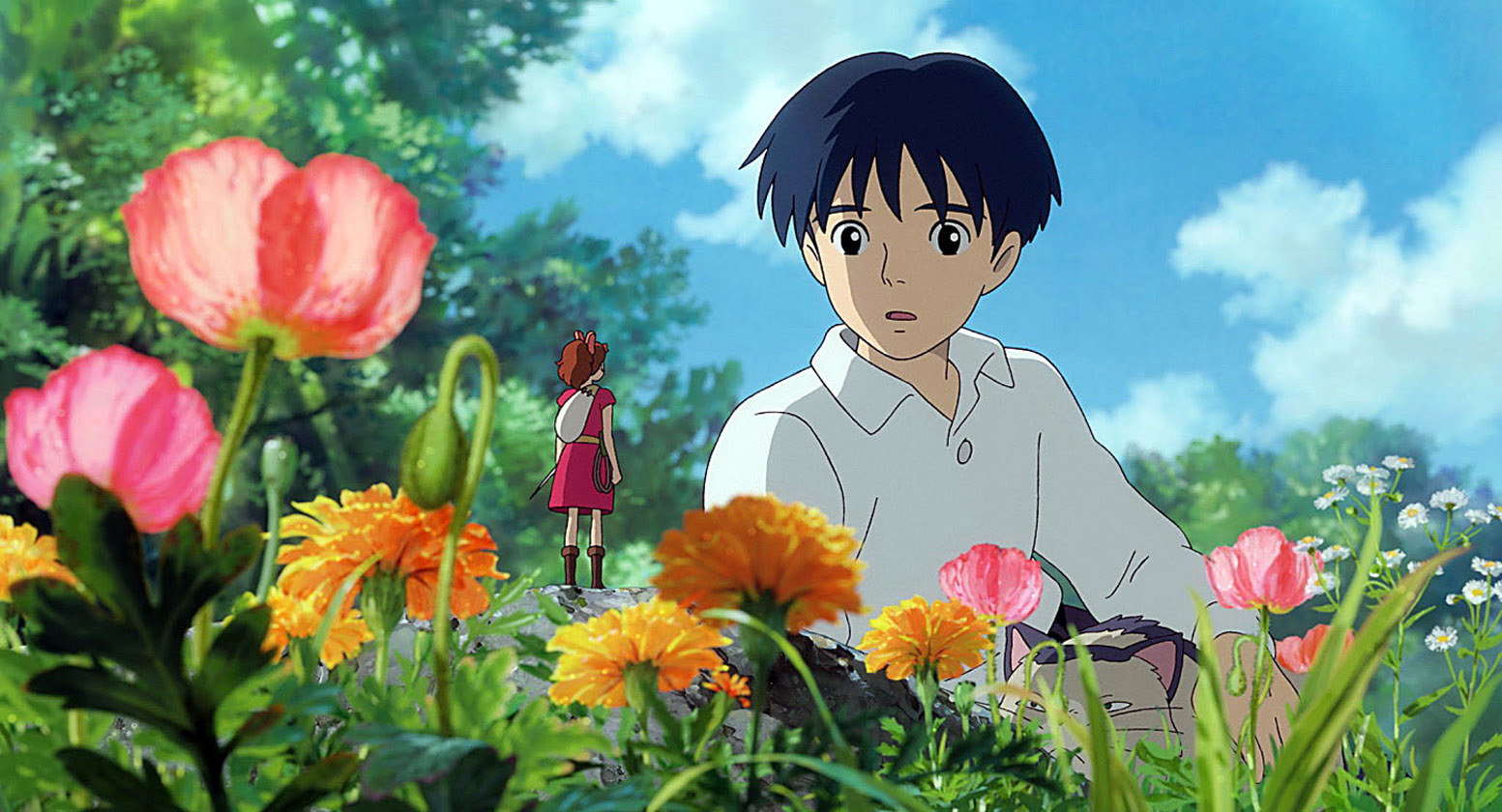 Arrietty standing on a flower as a towering Sho is looking back at her