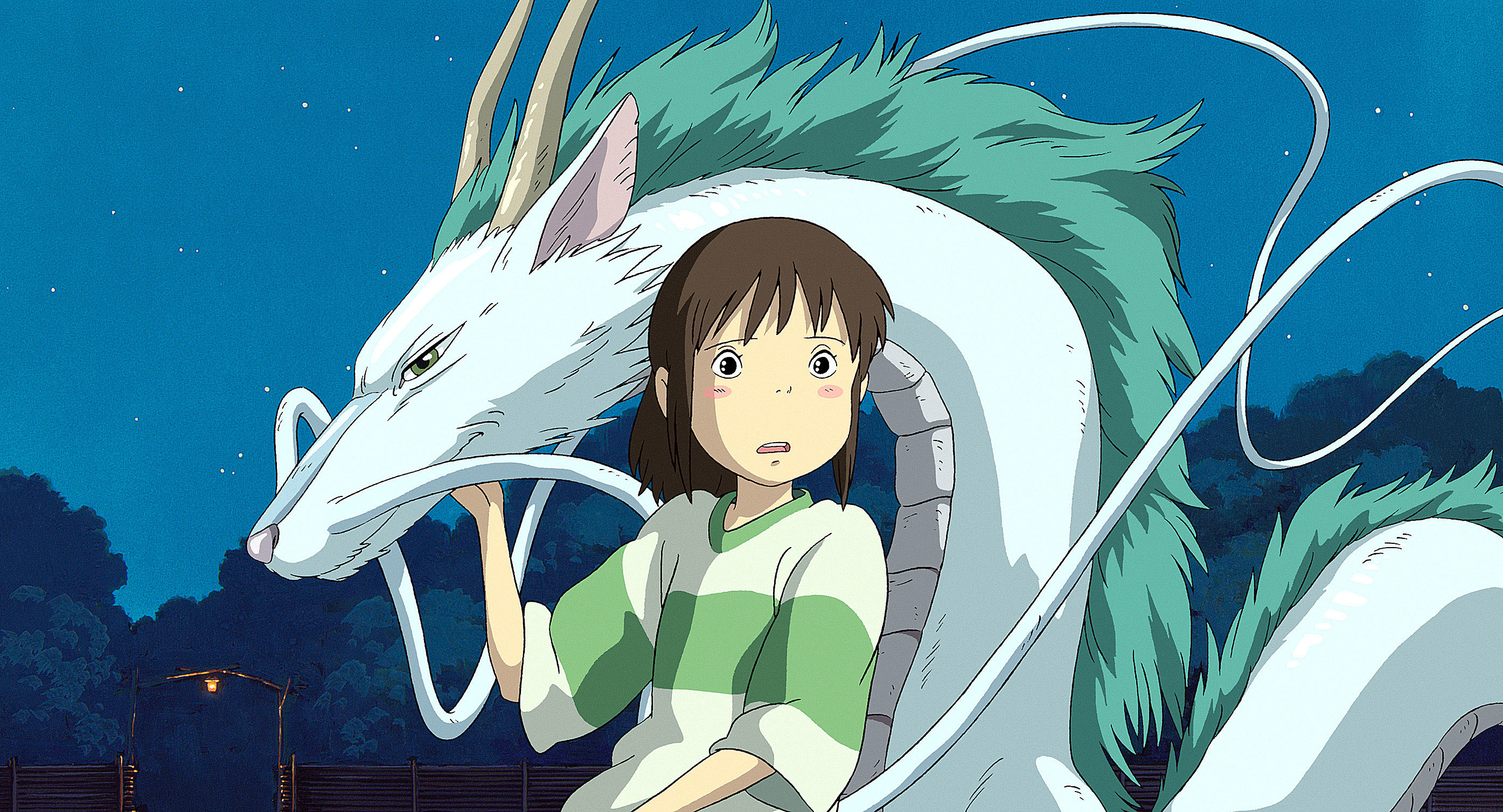 Chihiro looking worried while holding Haku in his white dragon form