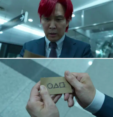 the end of the show when he gets the business card with the squid game symbols on it