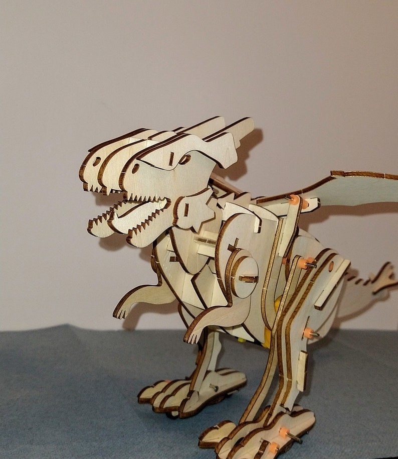a wooden robotic T-rex