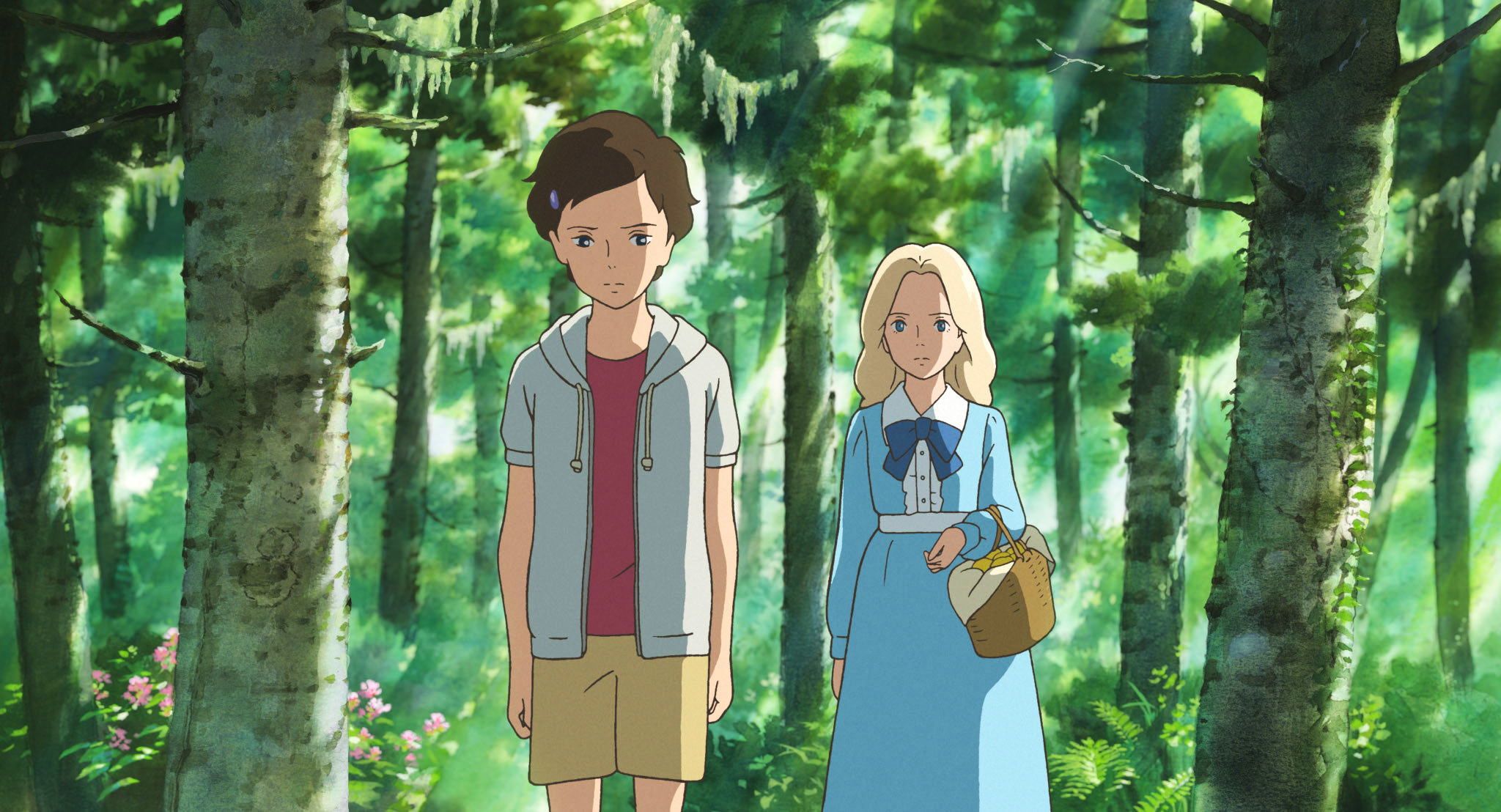 Anna and Marnie standing in the forest while Marnie holds a picnic basket
