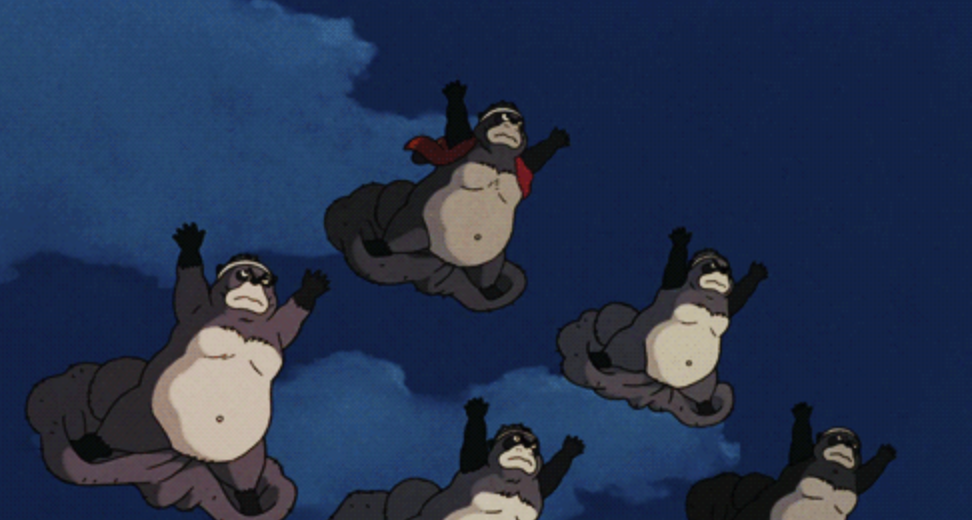 Tanukis high in the air about to glide into action