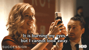 A gif of a woman saying &quot;it is burning my eyes, but I cannot look away&quot;