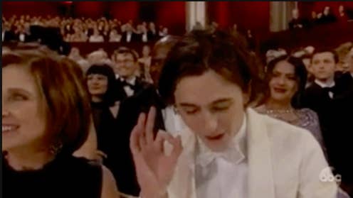 Timothée making an OK with his hand