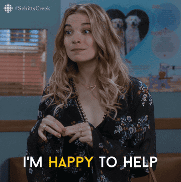 Annie Murphy as Alexis Rose holds her fingers together and looks up and down while expressing her desire to help in &quot;Schitt&#x27;s Creek&quot;
