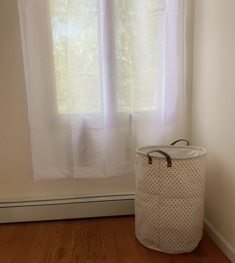 the free standing basket with faux leather handles and polka dot print