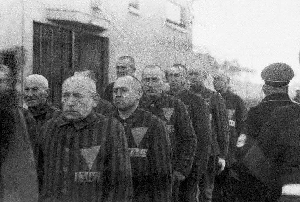 Jewish prisoners filing into concentration camp