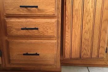 Reviewer's after shot of their cabinets, which have the new cabinet pulls on them
