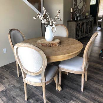 Reviewer's dining chairs are shown around a dining table