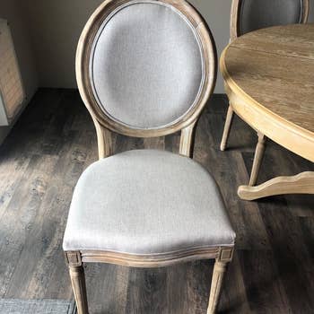 Reviewer's dining chair is shown close up