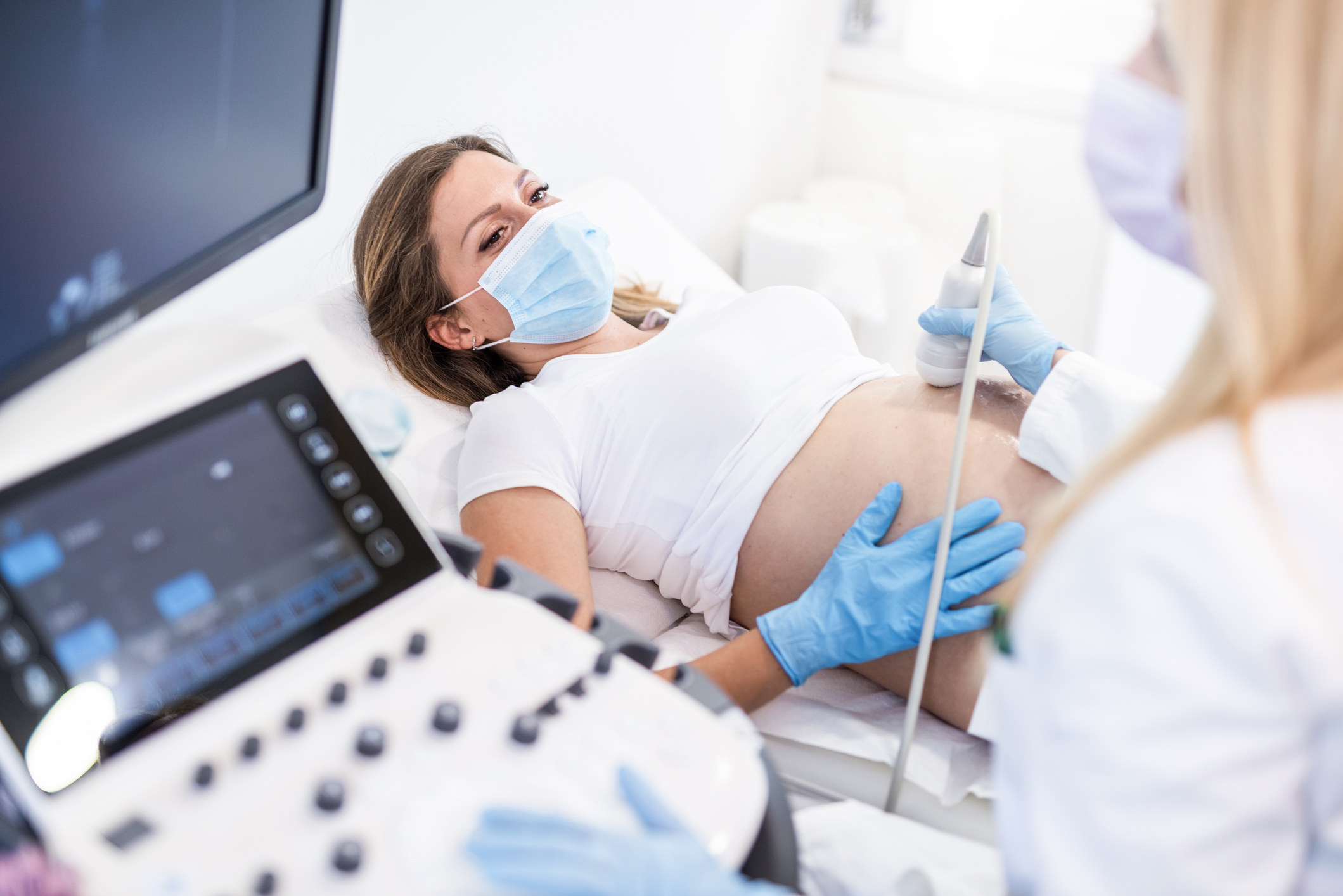 A woman getting an ultrasound at the doctor&#x27;s office