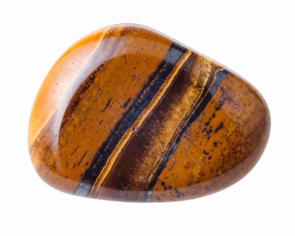 Smooth orange, brown and black striped and speckled stone tigers eye crystal 