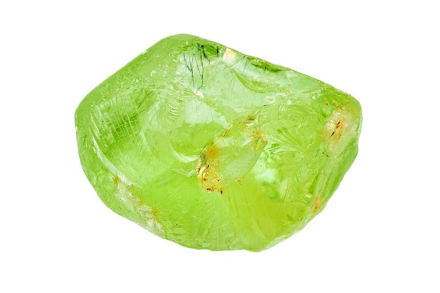 Bright lime green stone with yellow and white specs 