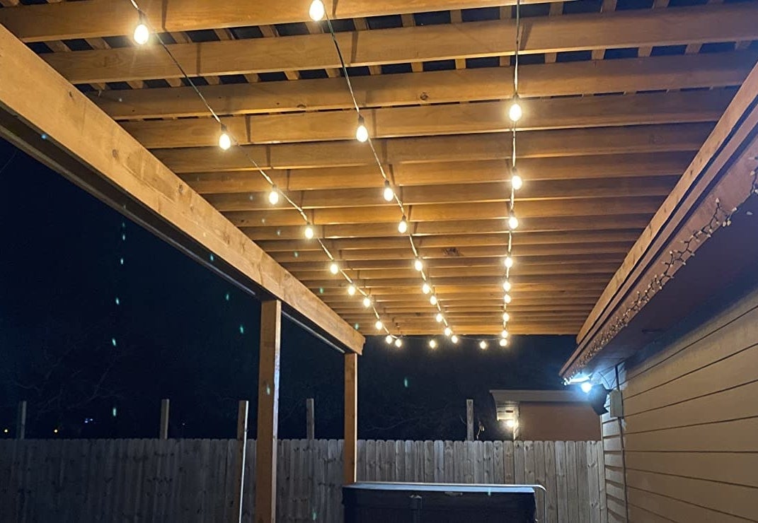 Reviewer image of white lights strung underneath deck