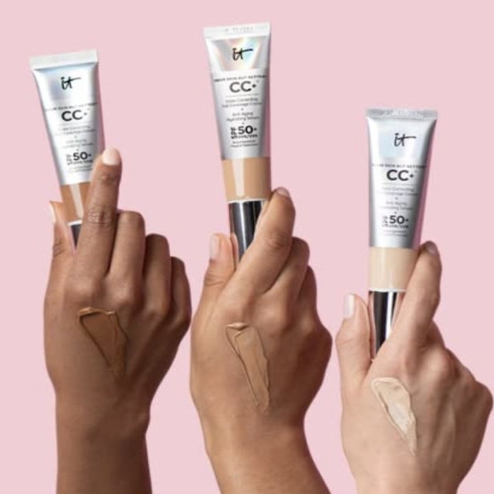 Three hands holding three shades of cc cream