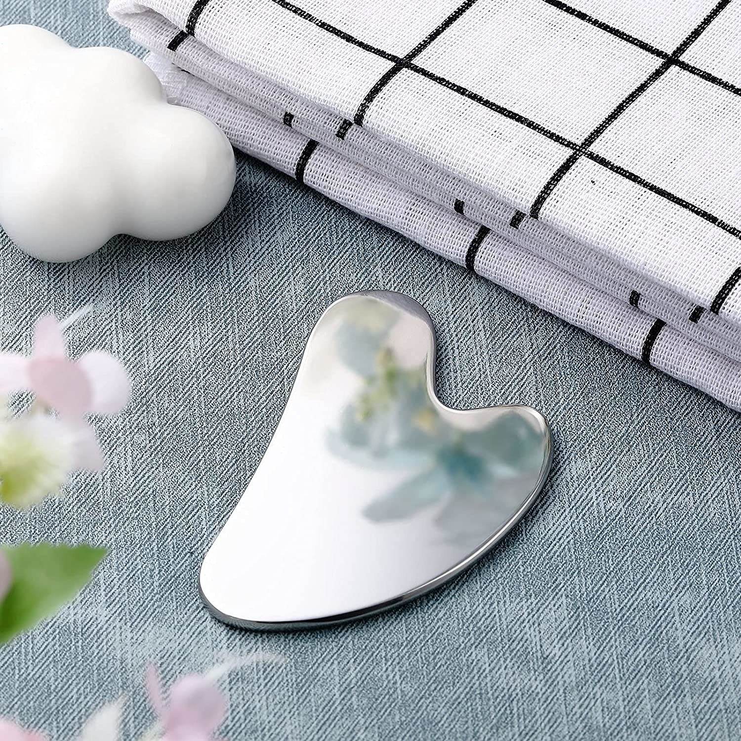 A stainless steel gua sha