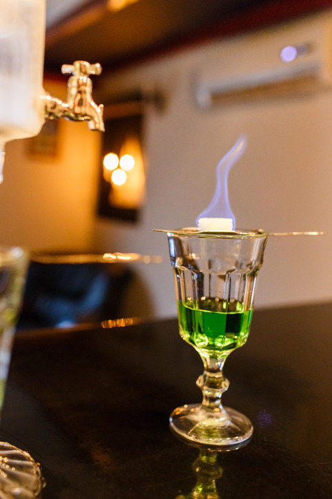 Absinthe with an aflame sugar cube on top