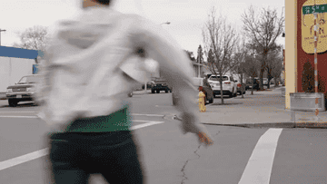A guy getting hit by a car