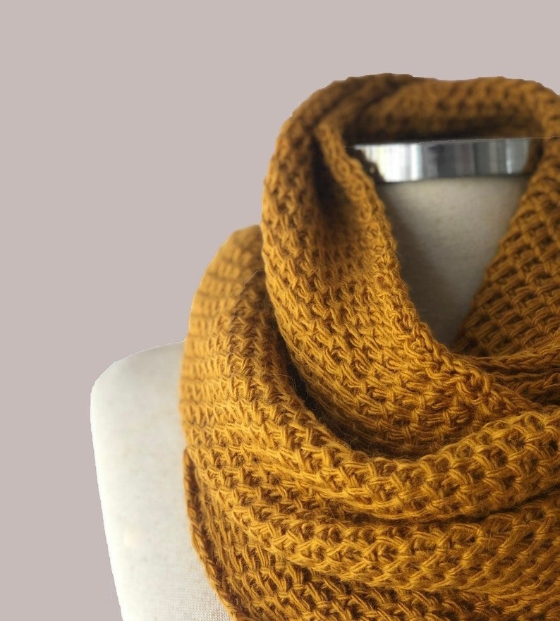 the scarf in mustard color