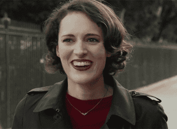 fleabag laughing and then grimacing