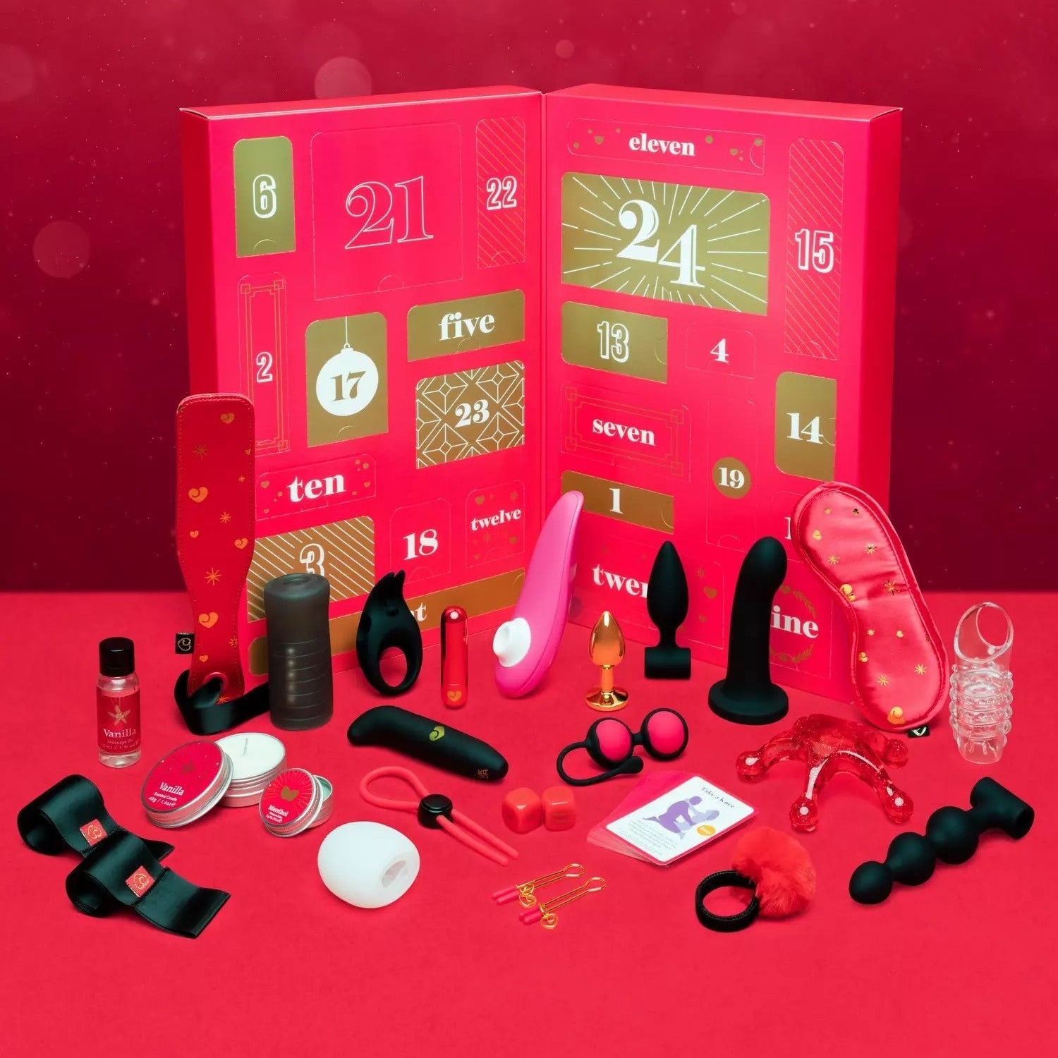 Red advent calendar surrounded by a variety of black, pink and red sex toys