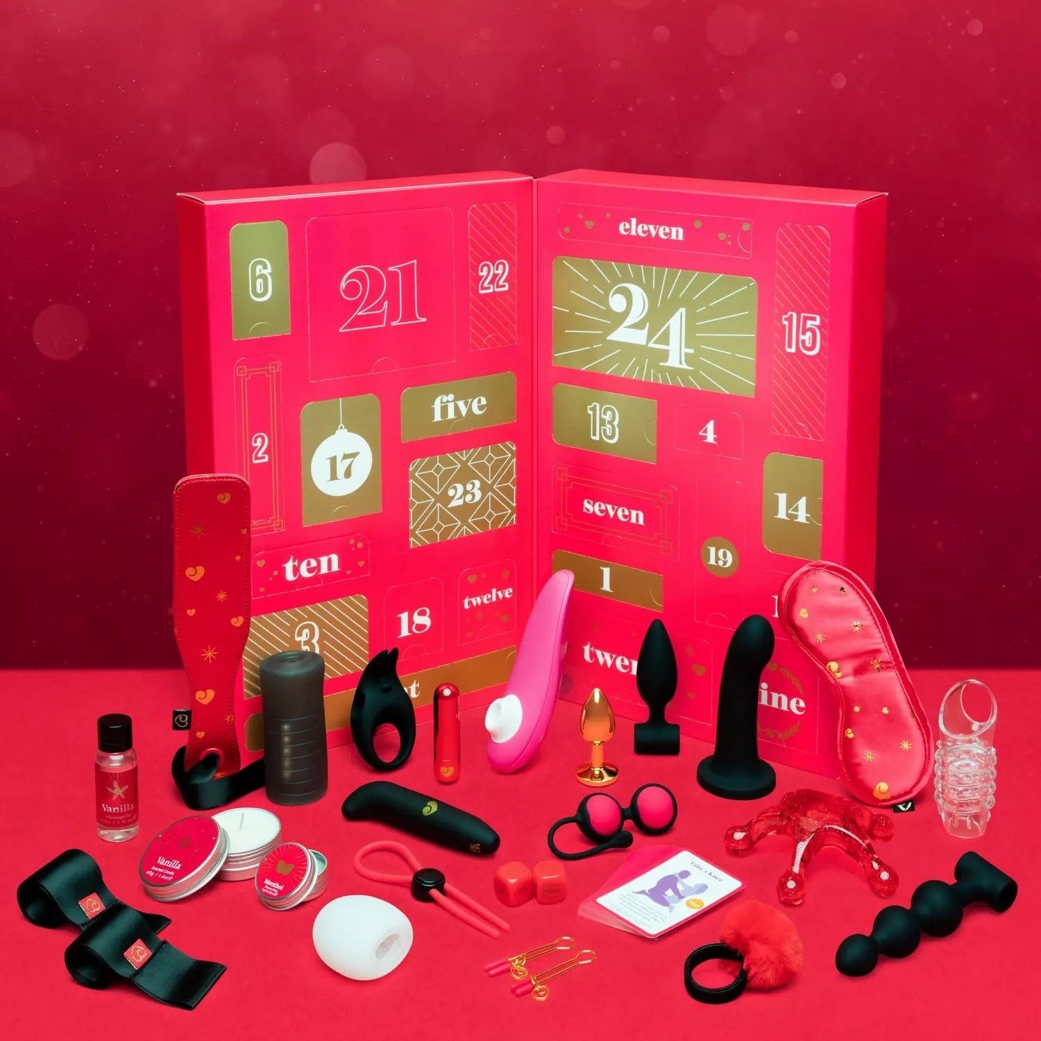 Red advent calendar surrounded by a variety of black, pink and red sex toys