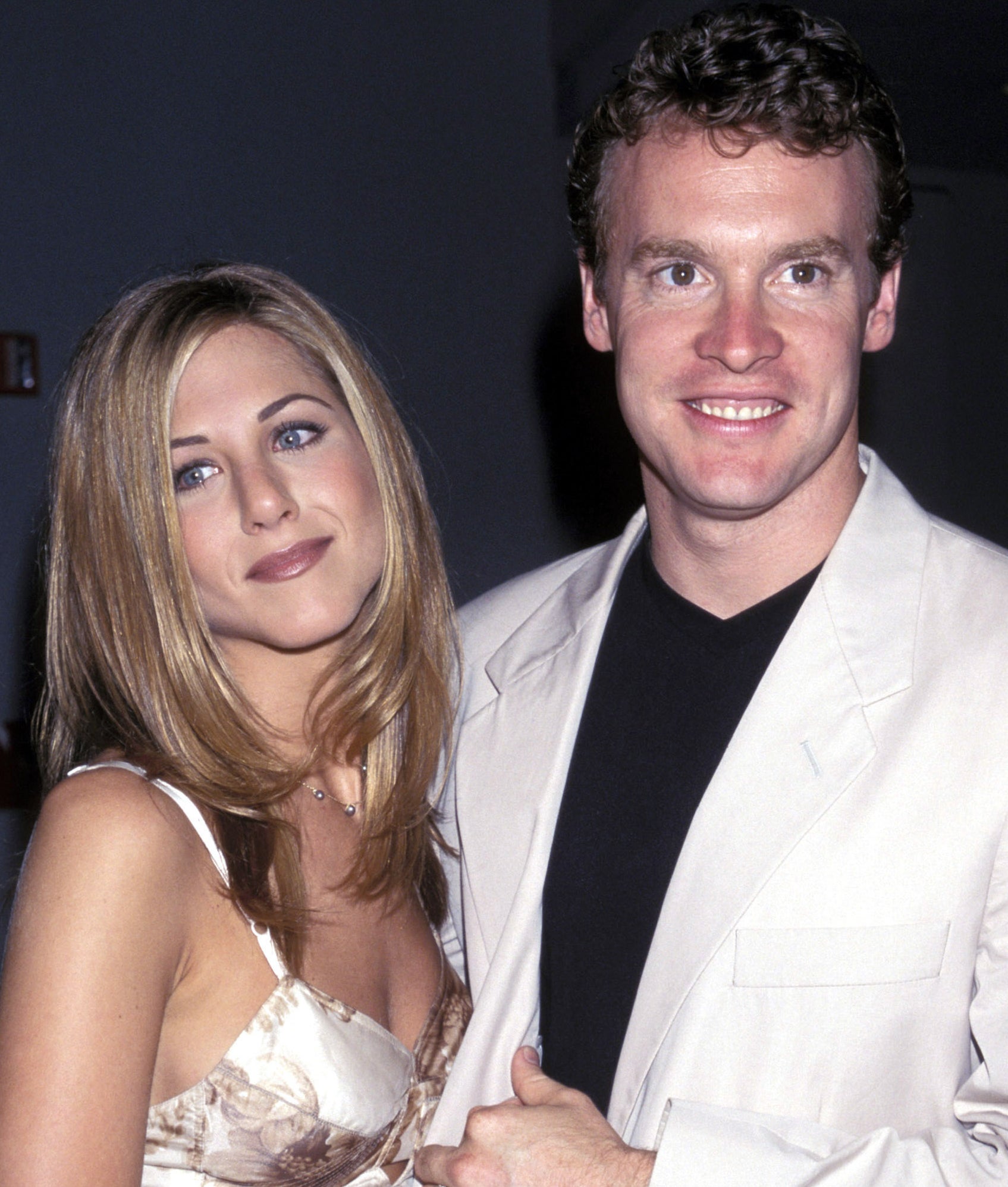 Photo of Jennifer Aniston and Tate Donovan at a premiere