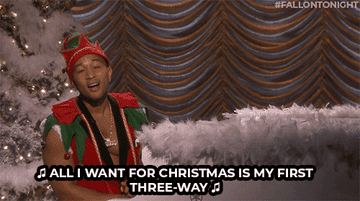 John Legend dressed as an elf singing &quot;all I want for Christmas is my first three-way&quot;