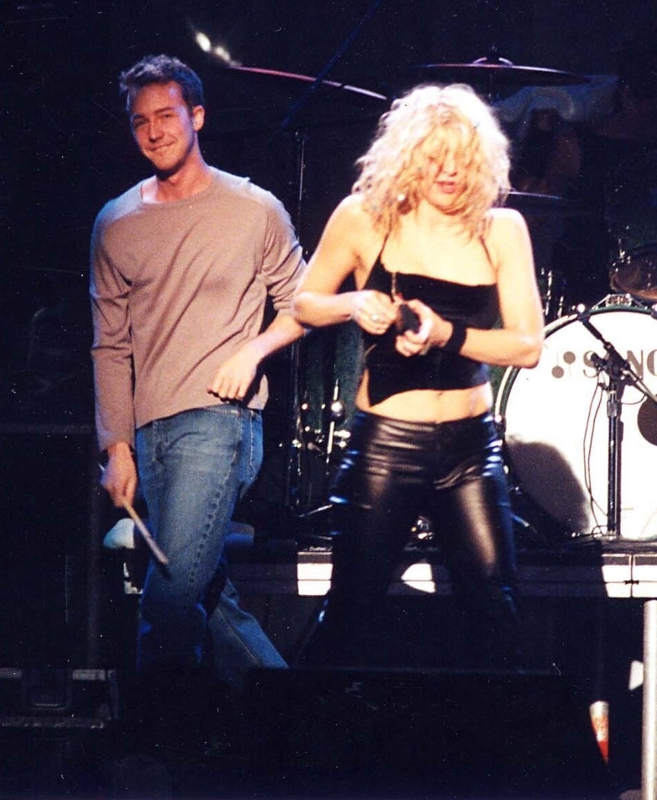 Photo of Courtney Love and Edward Norton performing onstage